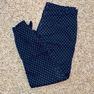 H&M size 8 ankle Trouser w side-zipper. Navy blue w geometric pattern